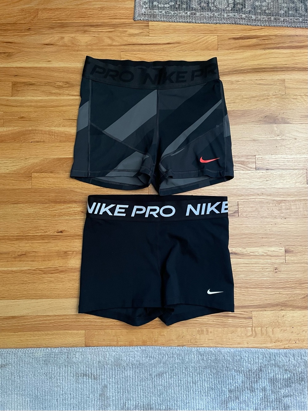 Pair of Nike Pro Dri-FIT mid-rise 3” training shorts - women’s sz M